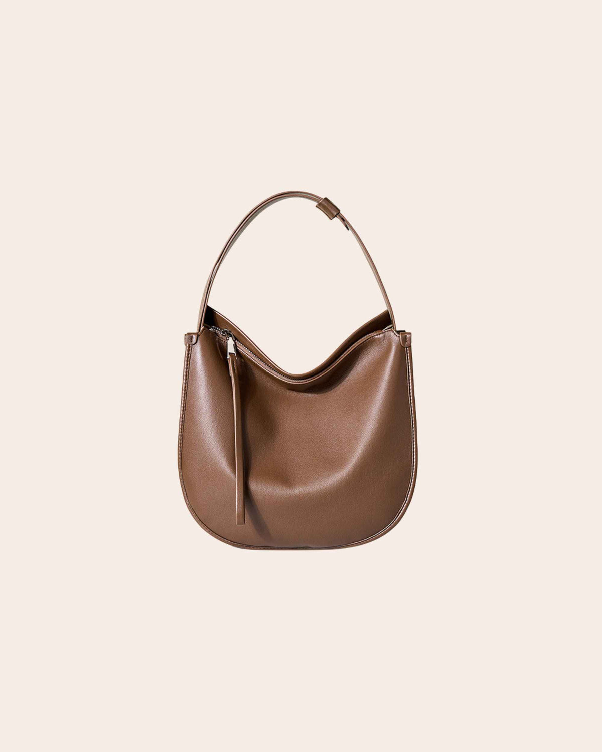 Drift soft leather hobo bag in coffee brown, with a curved shape and a zip top