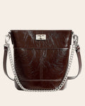 Kindred mini bucket bag in coffee brown oil waxed leather, on a chain strap with a turn lock