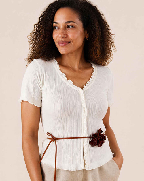 Bloom leather flower on a cowhide cord