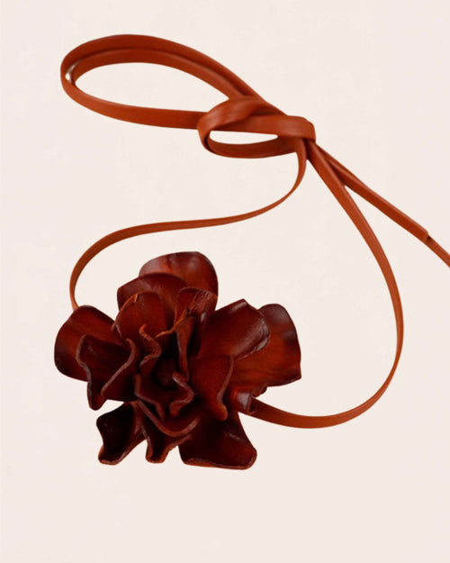 Bloom cowhide flower choker in coffee brown