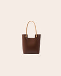 Nest tall leather tote bag in tea brown, with tan leather handles
